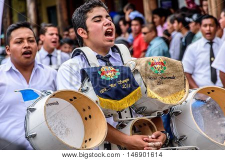 Antigua Guatemala - September 15 2015: Bands march in street parade during Guatemalan Independence Day celebrations