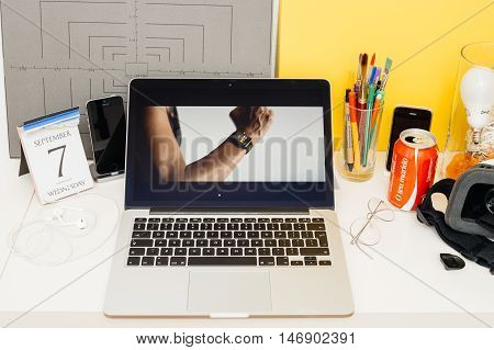 PARIS FRANCE - SEP 8 2016: Apple Computers website on MacBook Retina in room environment showcasing live coverage of Apple Keynote - Apple COO Jeff Williams on stage about waterproof Apple Watch series 2