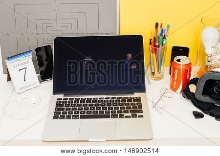 PARIS FRANCE - SEP 8 2016: Apple Computers website on MacBook Retina in room environment showcasing live coverage of Apple Keynote - Apple COO Jeff Williams about new Apple Watch Activity app