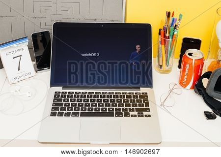 PARIS FRANCE - SEP 8 2016: Apple Computers website on MacBook Retina in room environment showcasing live coverage of Apple Keynote - Apple COO Jeff Williams about new Apple Watch