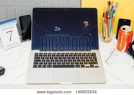 PARIS FRANCE - SEP 8 2016: Apple Computers website on MacBook Retina in room environment showcasing live coverage of Apple Keynote - Tim Cook talking about cometition with Google App Store