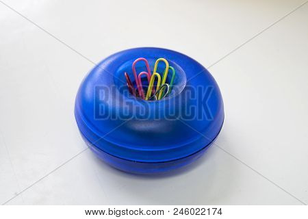 Bright Dispenser For Paper Clips. Stationery For Office.
