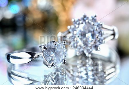 Close-up Of Silver Ring With Artificial Stone And Another Ring In Background - Jewelery, Cold Color 