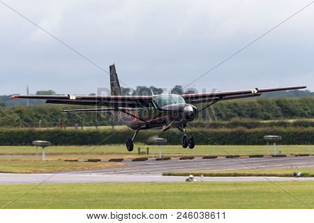 Raf Waddington, Lincolnshire, Uk - July 5, 2014: Cessna 208 Caravan G-dlaa On Approach To Land.