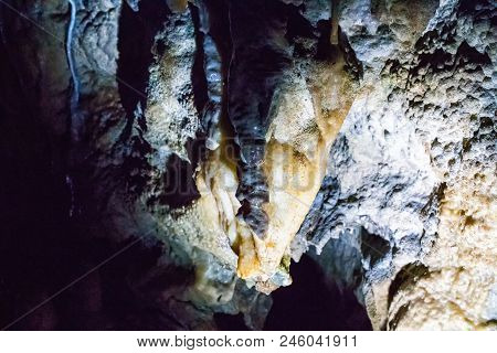 Illuminated Multicolored Stalactites In Cave Han-sur-lesse In Belgium