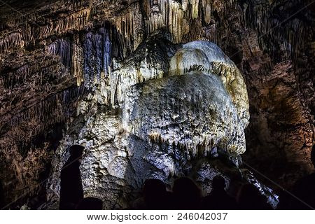 Illuminated Multicolored Stalactites In Cave Han-sur-lesse In Belgium