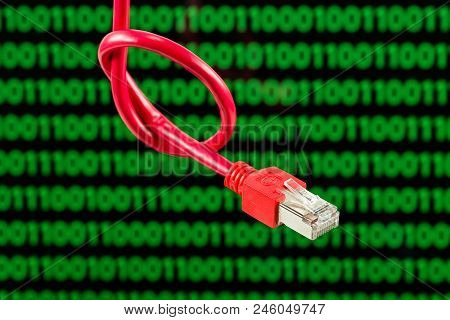 Red Patch Cable With Rj45 Connector And Knot Against Computer Screen With Digits