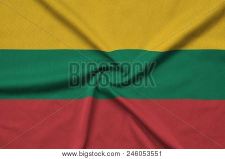 Lithuania Flag  Is Depicted On A Sports Cloth Fabric With Many Folds. Sport Team Waving Banner