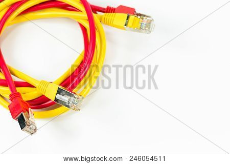 Red And Yellow Patch Cables With Rj45 Connector Isolated On White Background
