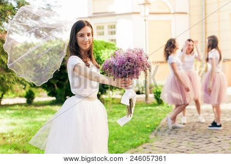 Wedding Veil Of Bride-to-be Ifluttering In The Wind Outdoors At Hen Party