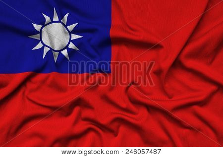 Taiwan Flag  Is Depicted On A Sports Cloth Fabric With Many Folds. Sport Team Waving Banner