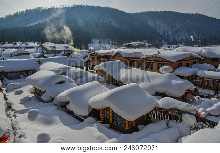 Snow Village At Sunny Day In Mohe County, Northernmost China.
