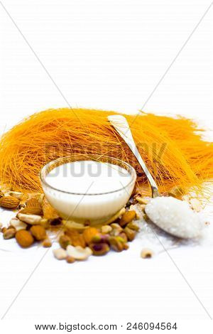 Close Up Of Raw Vermicelli Or Sevee Or Seviyan Or Seviyaan And Dry Fruits Isolated On White With A B