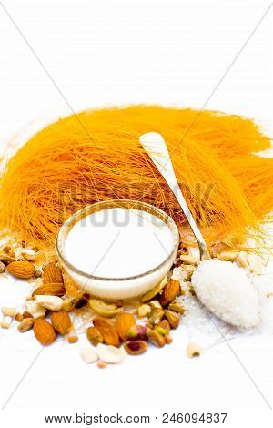 Close Up Of Raw Vermicelli Or Sevee Or Seviyan Or Seviyaan And Dry Fruits Isolated On White With A B