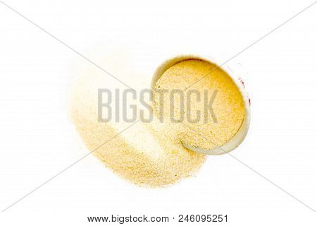 Semolina Flour In A White Colored Bowl Isolated On White Also Known As Sooji Or Suji.