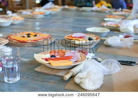 Cooking Class, Culinary. Food And People Concept, Desktop Getting Ready For Work, Ingredients For It