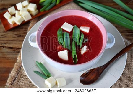 Beet Soup-puree Topped With Bryndza And Green Onion In A Ceramic Tureen