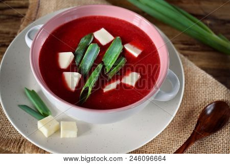 Beet Soup-puree Topped With Bryndza And Green Onion In A Ceramic Tureen