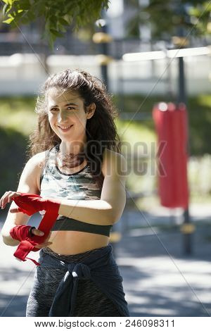 Portrait Of Young Woman - Box Spotsman In Summer Park During Work Out Training, Close Up
