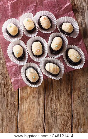 Authentic Brazilian Sweet Candies Olho De Sogra With Dried Plums Close-up. Vertical Top View