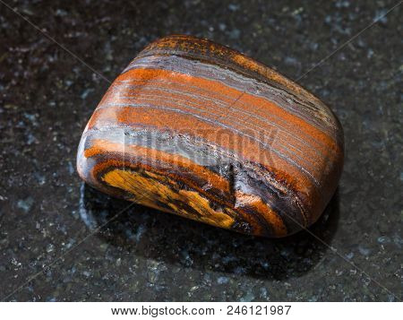 Macro Shooting Of Natural Rock Specimen - Jaspillite (jaspilite, Taconite Jasper) Gemstone On Black 