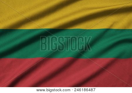 Lithuania Flag  Is Depicted On A Sports Cloth Fabric With Many Folds. Sport Team Waving Banner