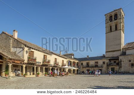 Pedraza, Segovia, Spain; July 2015 : Tourists In The Main Square Of Pedraza One Summer Day