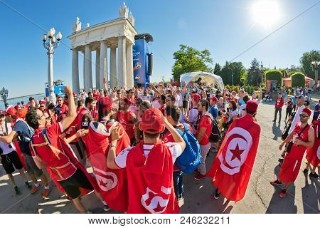 Football Fans Of The National Team Of Tunisia With National Flags And Attributes