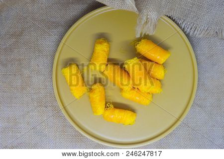 Thai Traditional Dessert (foi Thong) On Yellow Dish