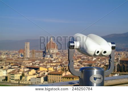Piazzale Michelangelo. Italy - Circa March 2017 - Telescope View Of Florence As Viewed From The Inte