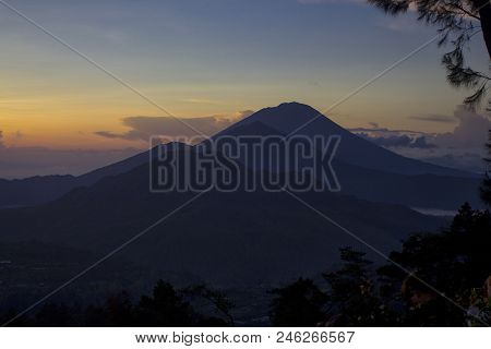 Kintamani, Bali, Indonesia. View Of Sunrise Over Mountain And Volcanos