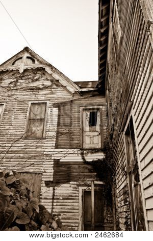 Seppia Run Down House