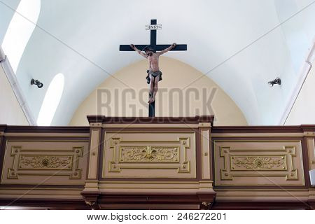 ZRNOVO, CROATIA - MARCH 21: Crucifix on the choir in the Saint Martin Church in Zrnovo, Korcula island, Croatia, on March 21, 2017.
