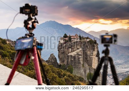 Professional Camera On Tripod Taking Picture Film Video From The Holy Trinity Monastery On Cliff At 