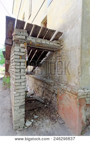 Residential Brick Three-storey House On Kerch Street 5. Photo On A Wide-angle Lens With Distortion. 