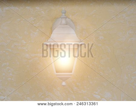 Rustic Light Is Lighting On On The Concrete Wall. Light Is Switched On. Textured Background. Close U