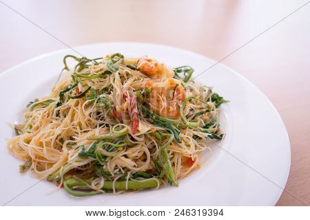 Thin Rice Noodles Stir Fried With Shrimp And Water Minosa Or Mee Phat Krachet Koong In Thai