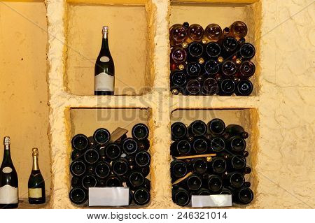 The Champagne Bottles In A Wine Cellar