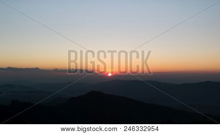 The Last Light Above The Mountains Of Phu Chi Fa, Chiang Rai, Thailand.