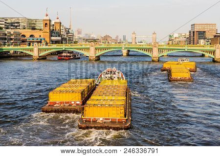 London. June 2018. A View Of Cargo Tugs On The Ruiver Thames In London.
