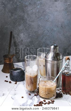 Iced Coffee Cocktail Or Frappe With Ice Cubes And Cream In Different Glasses With Jezva, Silver Shak