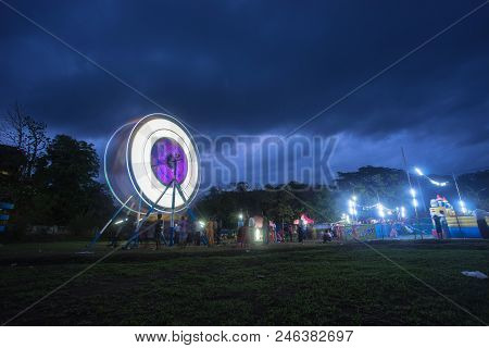Mrauk U Myanmar On May 24, 2016: Ferries Wheel Spinning In The Night Market