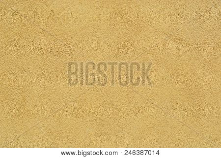 Yellow Brownish Plaster On Wall As Background