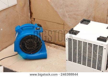 Elimination Of Water Damage With Fan And Dryer
