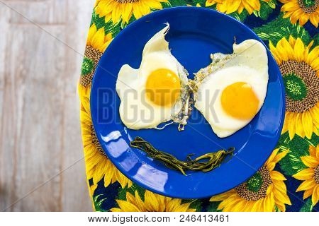 Present Food Plate - Funny Food Faces Smile Fried Eggs Eyes Vegetable Mouth On Blue Dish Yellow Sunf