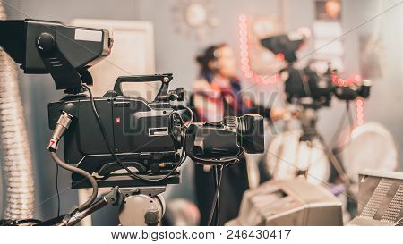 Behind The Scene. Multiple Camera Setup. Cameraman Shooting The Film Scene With Camera In Film Studi