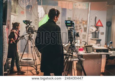 Behind Scene. Multiple Camera. Cameraman Shooting Film Scene With Camera
