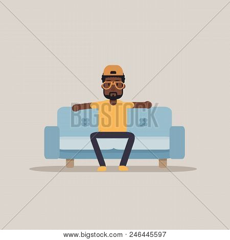 African Boy Relaxing On Sofa. Man Cartoon Character Sitting On Sofa. Vector Stock.