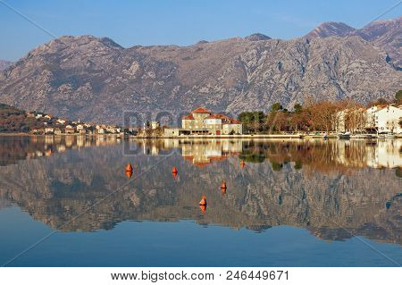 Beautiful Symmetrical Landscape Where Mountains And Coast Are Reflected In Water. Montenegro, Bay Of