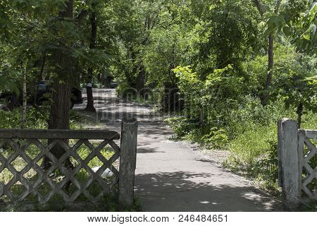 Old Concrete Fence And Pedestrian Path. Old Architecture.
